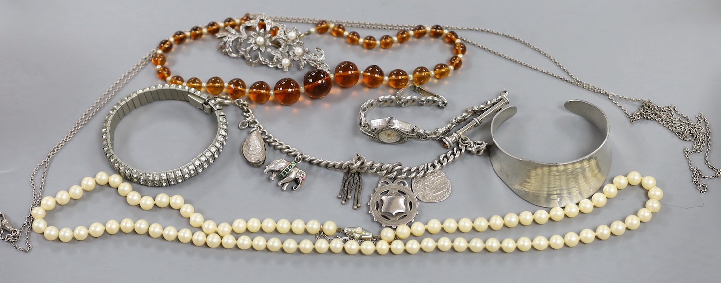 A silver charm bracelet, white metal charm bracelet and a small group of assorted costume jewellery.